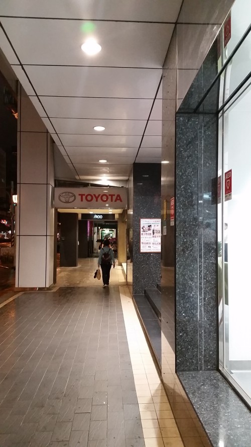 Keep walking straight. You'll pass a Toyota dealer.